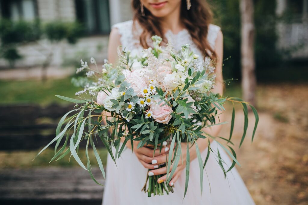 wedding flowers bride with bespoke rose and eucalyptus flower bouquet