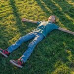 Blissfully relaxing on the lawn at sunset